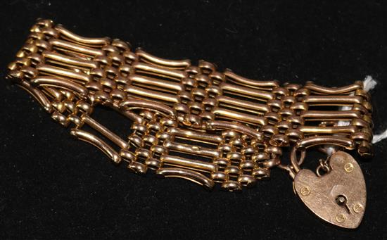 A 9ct gold fancy link bracelet with padlock clasp, 20.5 grams.